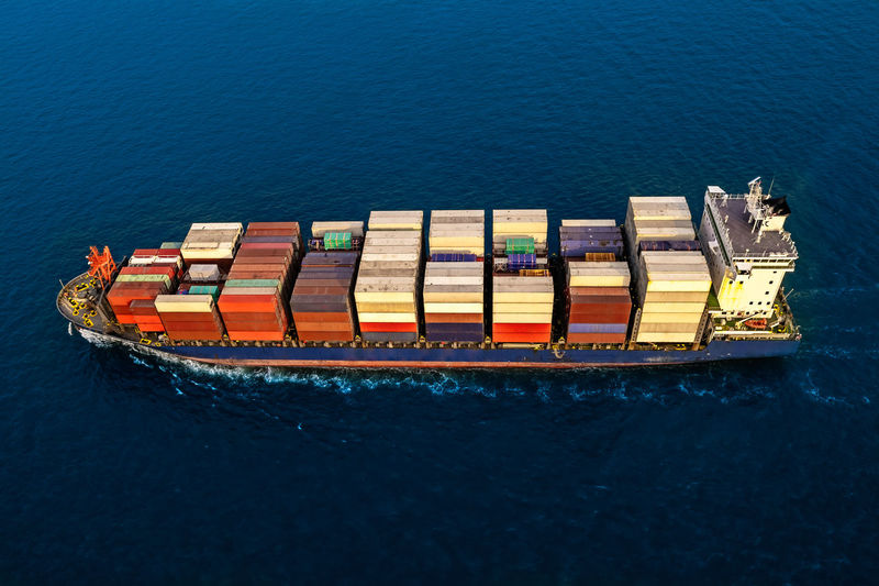 Aerial view container cargo ship in import export business logistic and transportation.