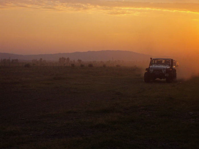 Scenic view of landscape at sunset