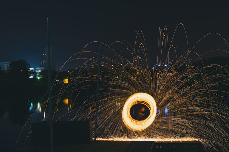 Light painting against clear sky at night