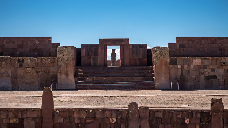 Old ruins against clear blue sky