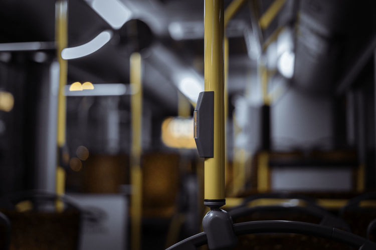 Yellow handle bar in bus