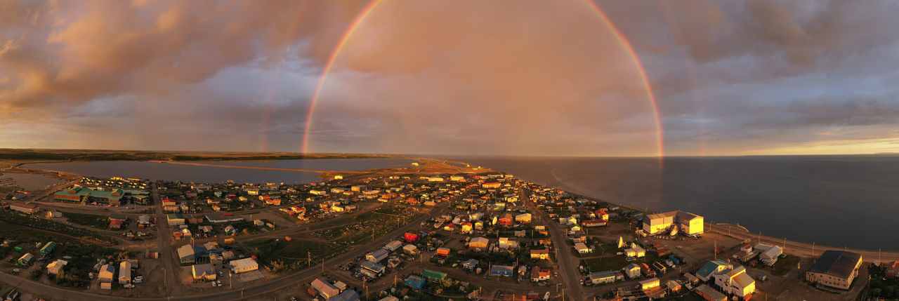 High angle view of rainbow over city