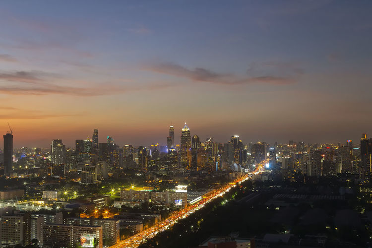 Panorama of landscape with sunset over the building and blue sky at bangkok ,thailand.