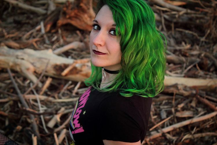 Portrait of young woman with dyed hair