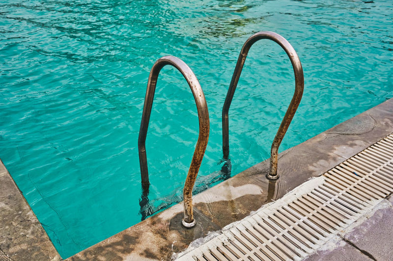 High angle view of swimming pool railing 