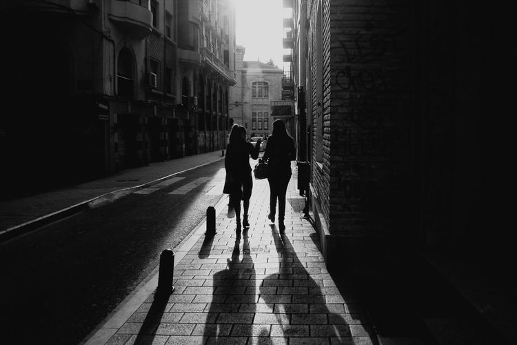 People walking on city street