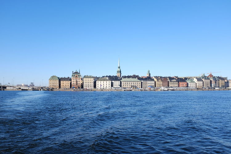 Buildings in distance with waterfront