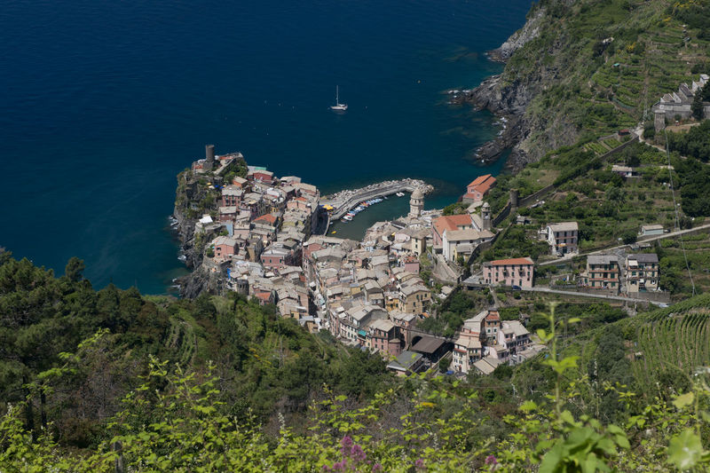 High angle view of townscape by sea