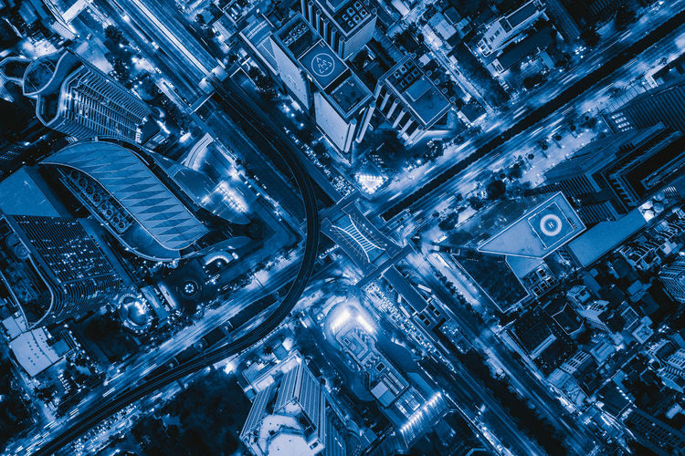 Aerial view of illuminated city street at night
