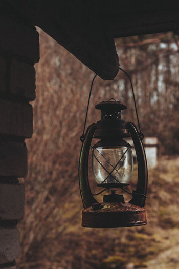 Close-up of lantern hanging outdoors
