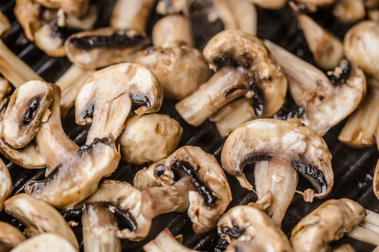 Full frame shot of mushrooms on barbecue grill