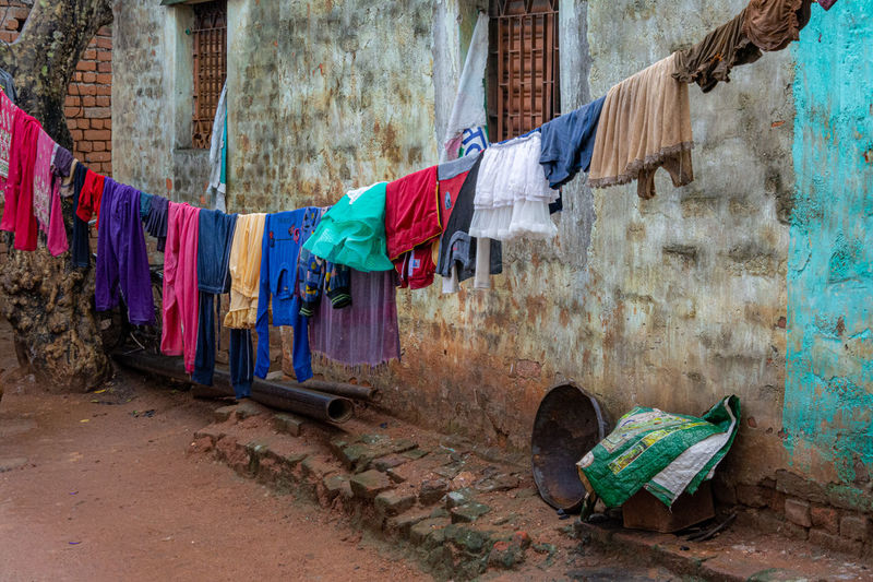 Clothes drying against wall in village