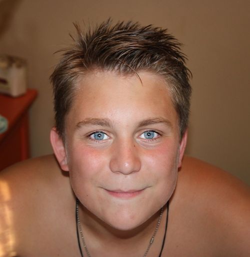 Teen male smiling. beautiful blue eyes 