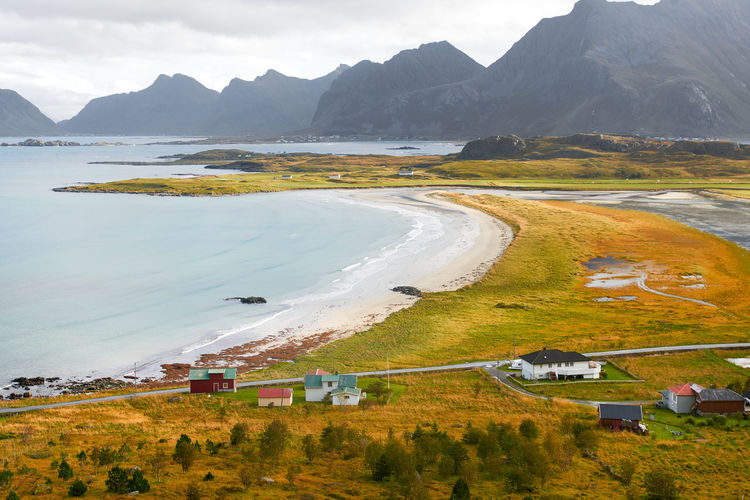 Panoramic view from mountain top over beach and countryside at coast in moskenesoya lofoten norway