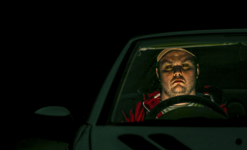Portrait of man in car