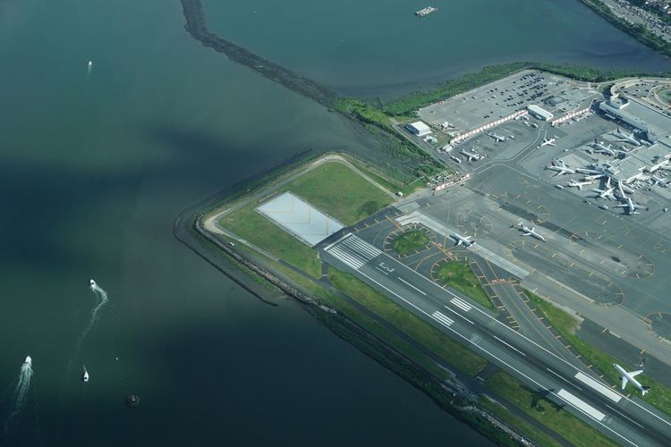 High angle view of airport by sea