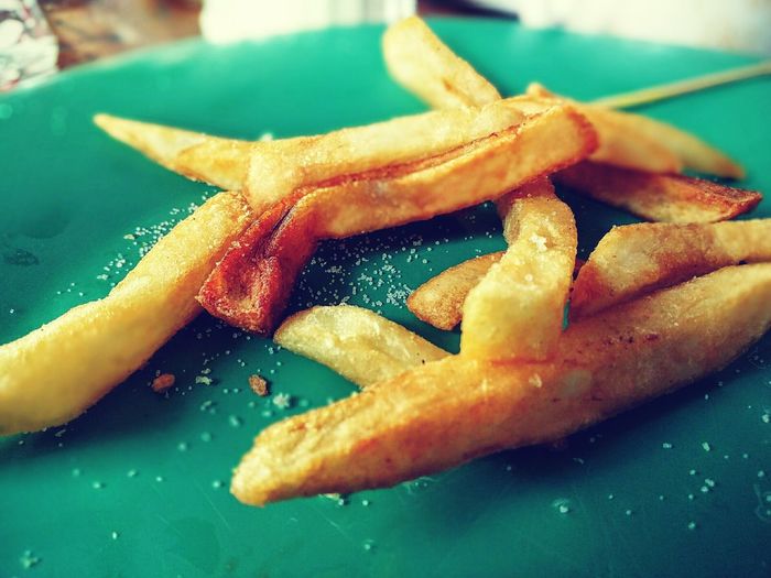 Close-up of french fries in plate