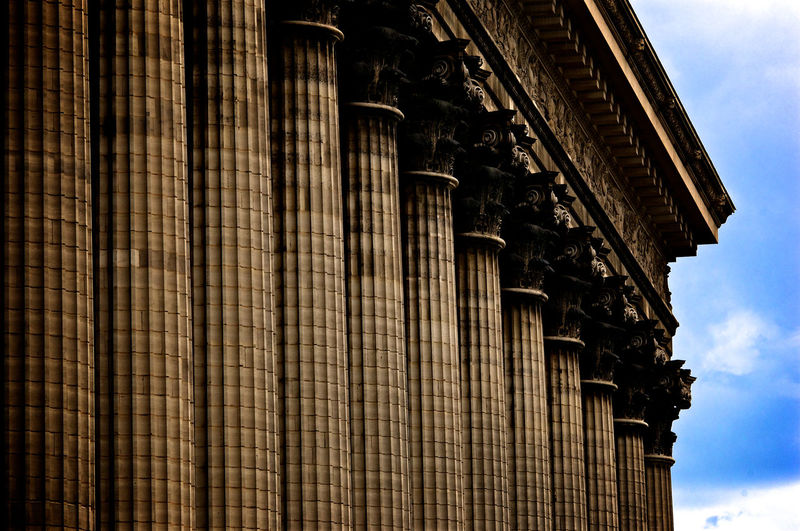 Low angle view of colonnade at la madeleine