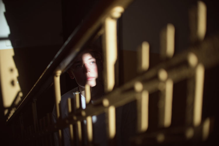 High angle view of woman at staircase