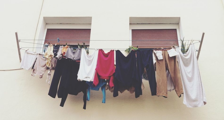 Clothes hanging in row