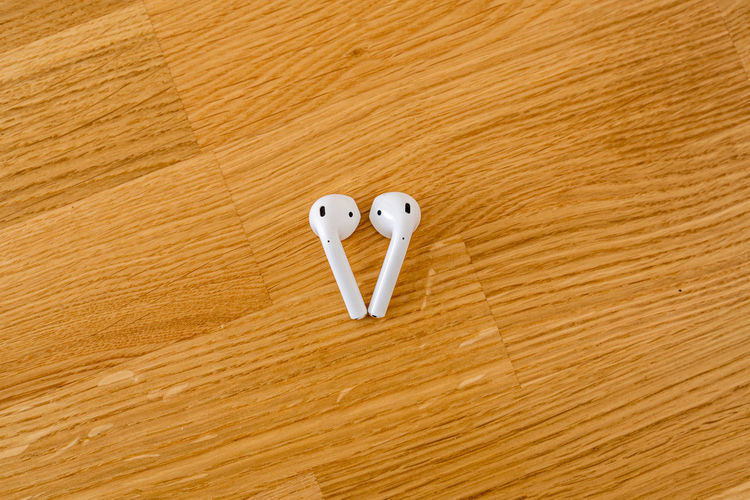 Directly above shot of earphones on table