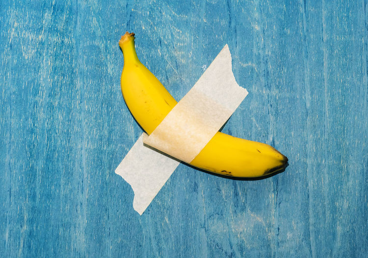 High angle view of bananas on blue table
