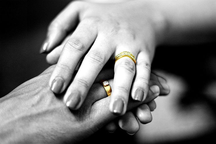 Close-up of holding hands with ring