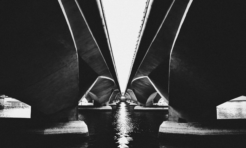 Symmetrical shot taken under the esplanade bridge in singapore