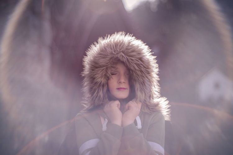 Girl wearing warm clothing during winter