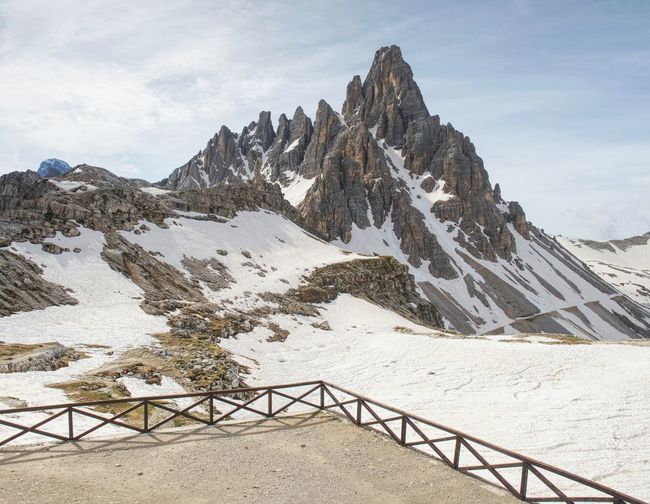 Magnificent view from terrace to symbol of dolomite alps - tre cime. view from mountain hut 