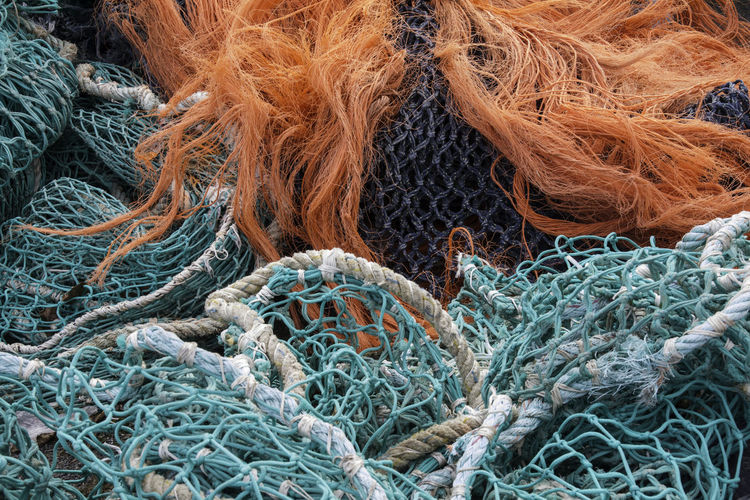 Full frame shot of fishing net at harbor