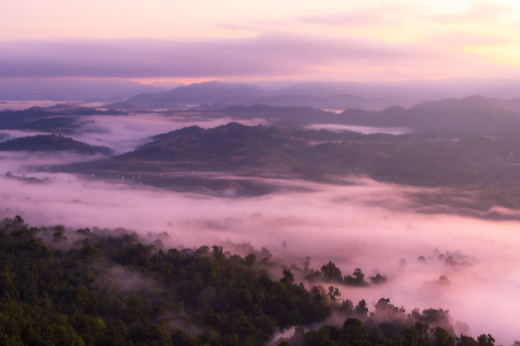 Scenic view of mountains against sky during sunset