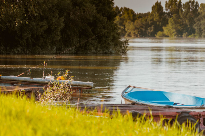 Boats moored at danube riverbank