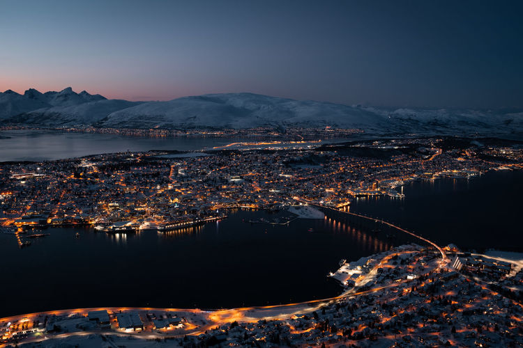 Tromsøysundet tromsø norway landscape and cityscape panorama with mountainous background in winter. 