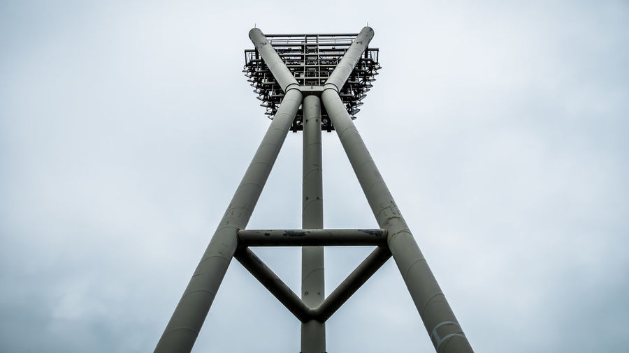 Low angle view of floodlight pole