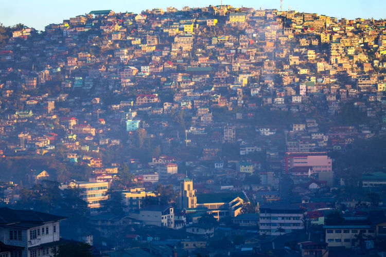 Aerial view of cityscape located on a mountain 
