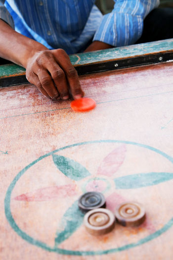 Detail shot of playing carom board
