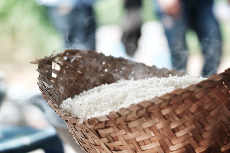 Close-up of cooked rice in wicker basket