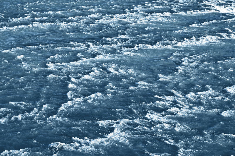 Full frame shot of blue sea against sky