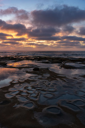 Scenic view of sea against sky during sunset