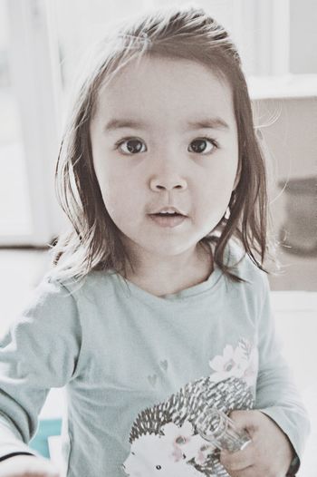 Portrait of cute girl at home
