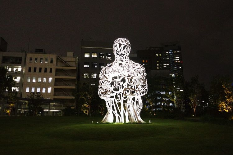Sculpture of illuminated building at night