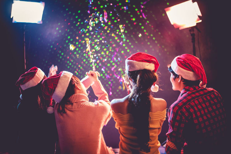 Rear view of friends during christmas