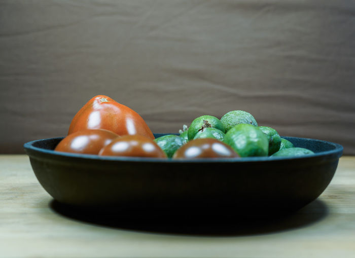 Close-up of fruit in bowl on table
