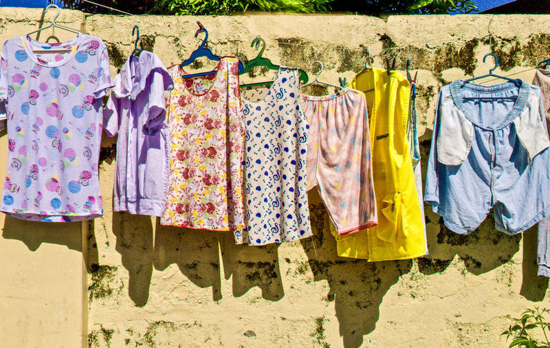 Clothes drying against wall