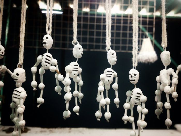 Close-up of stuffed toy hanging at market stall