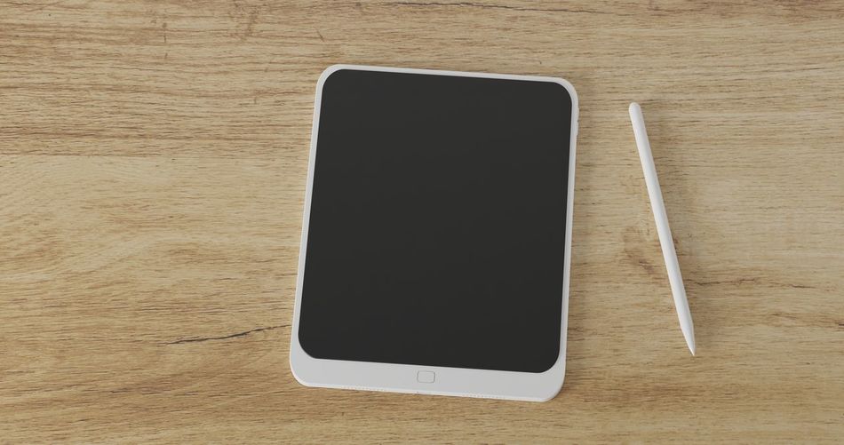 High angle view of smart phone on table