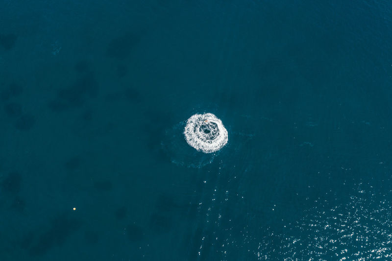 High angle view of bubbles over sea