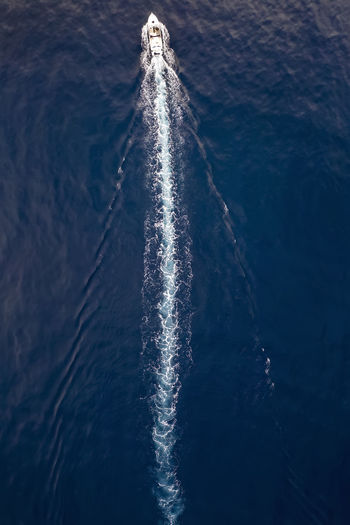 High angle view of water splashing in sea