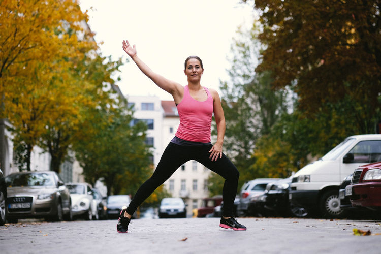 Full length of woman jumping in mid-air